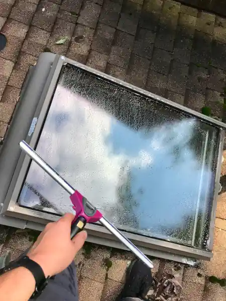 picture of a skylight being cleaned